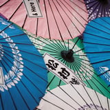 傘咲かす