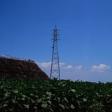 The steel tower seen from the field