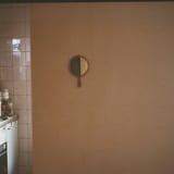 A hand mirror.